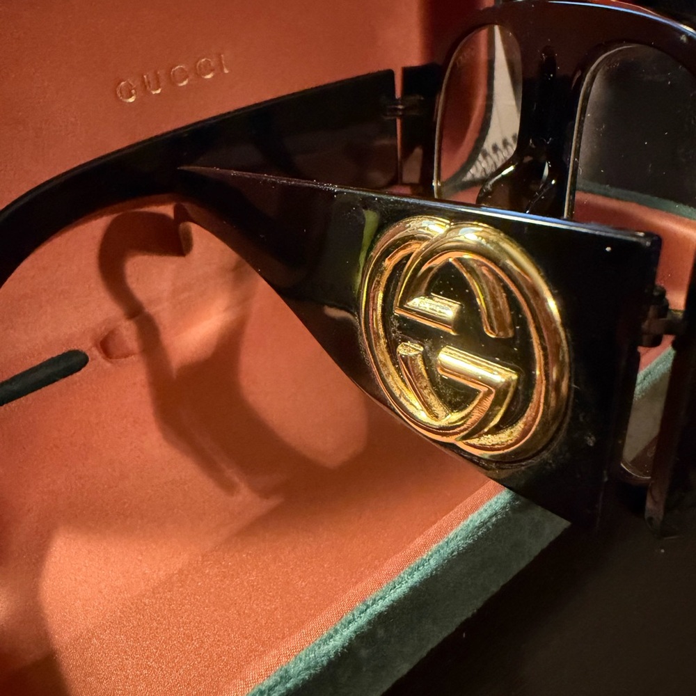 Gucci Black Sunglasses with Gold Emblem